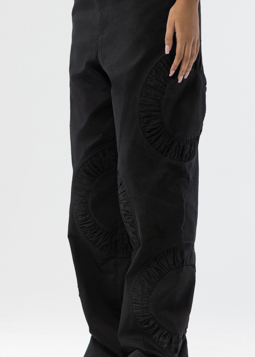 ANICRU Cotton Twill Chino Benny Pant in black, close-up of ruched circular panel
