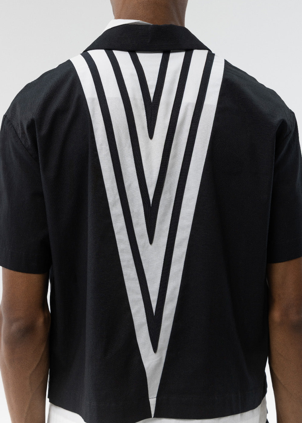 ANICRU Star Shirt in black and white, back view

